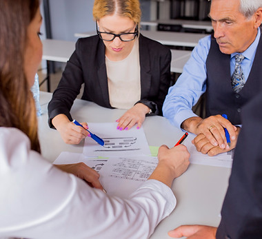 group-business-people-discussing-business-plan-table-office.jpg