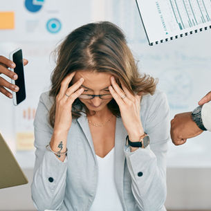 Teacher experiencing stress and burnout while managing competing workplace demands.