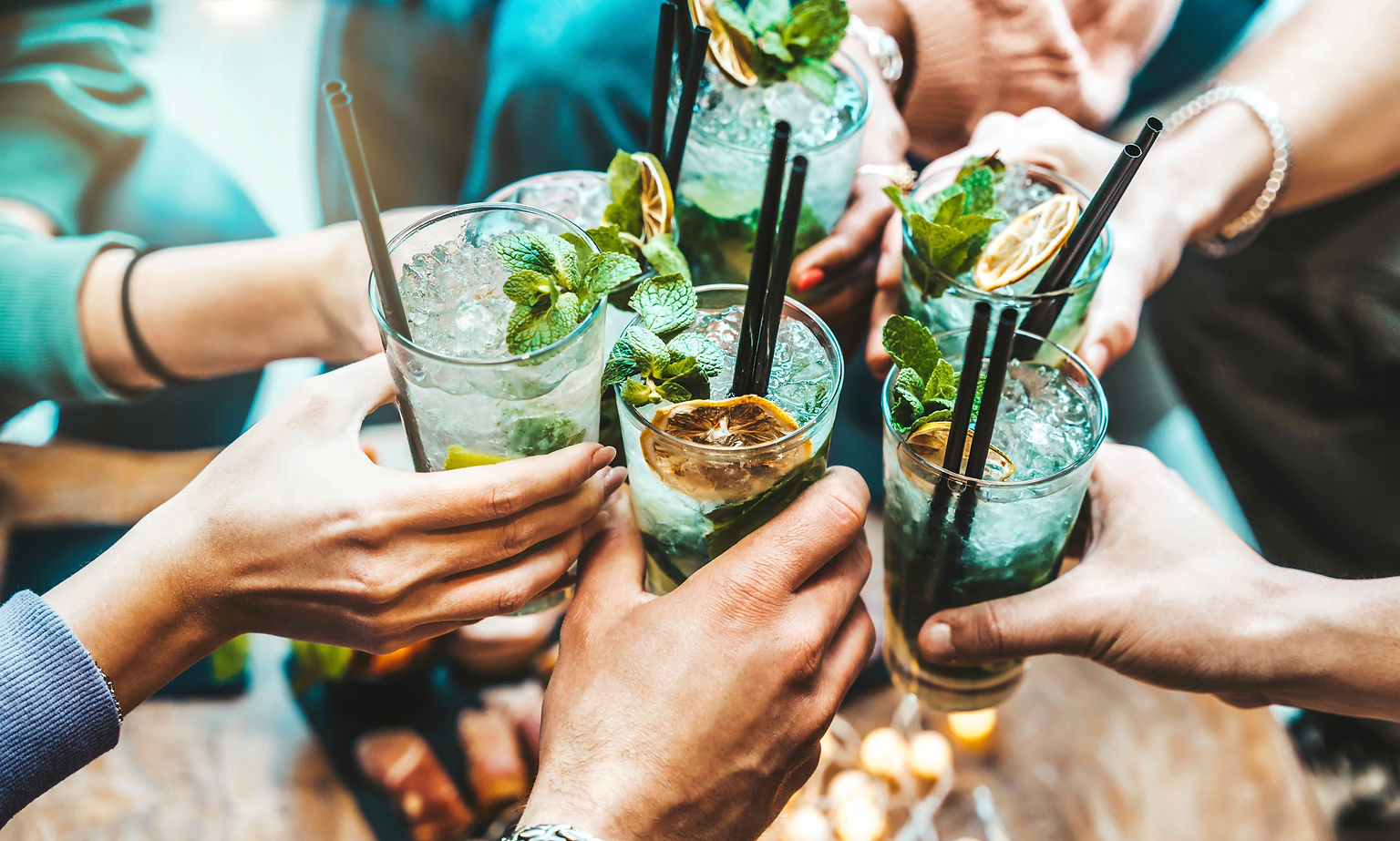 happy-friends-group-cheering-mojito-drinks-at-fanc-2023-03-15-21-55-03-utc.jpg