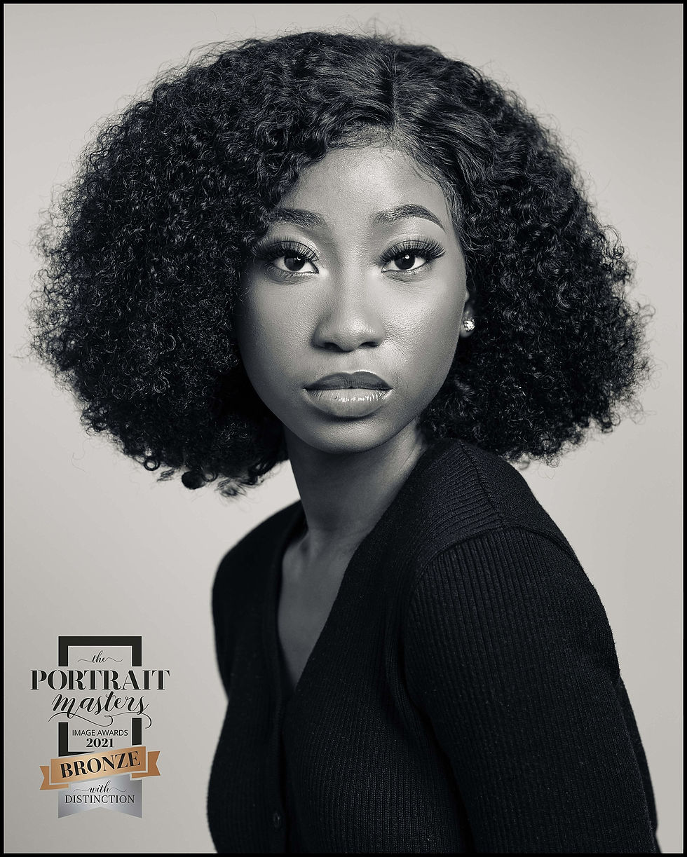 Portrait of young woman in professional headshot, awarded Bronze Merit with Distinction