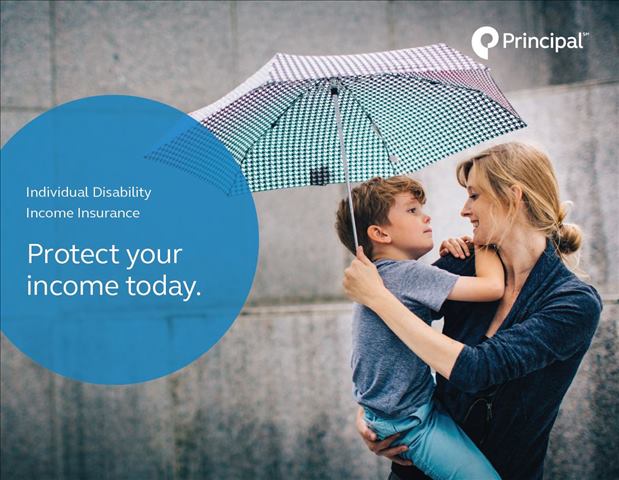 woman holding young boy with umbrella