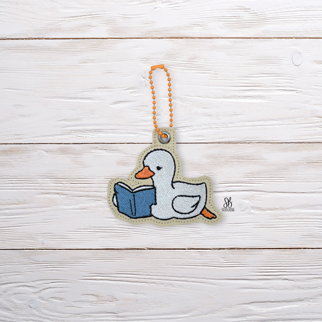 Goose Reading Eyelet Machine Embroidery Design