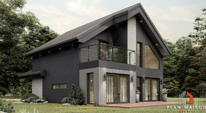 Vue arrière d’un chalet contemporain avec mezzanine et galerie couverte