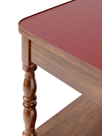 Close-up view of the vintage wooden side table's top surface, showing the fine details of the wood texture and edges.