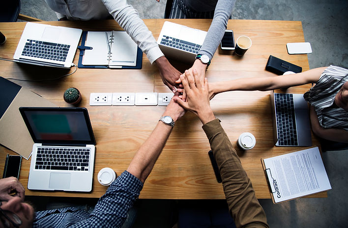 team-business-people-stacking-hands (1).jpg