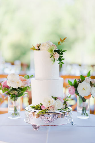 White wedding cake with flowers