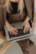 marketing strategist working on laptop