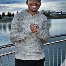 High school senior in a grey shirt and