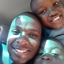 Tapiwa Gondo with siblings