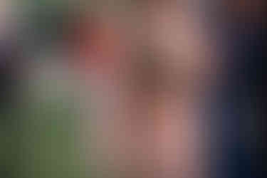 brides mom holds photo of her father