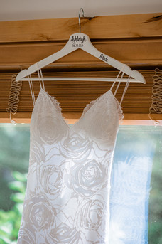 rose wedding dress hanging