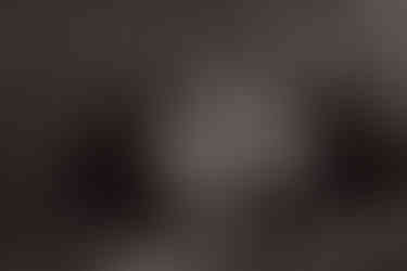 black and white family photo with newborn