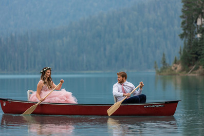 Anniversary photos in canoe on Lake Emerald
