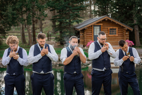 groomsmen smoking cigars