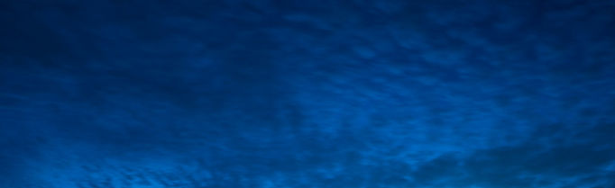 The Singapore sky at dusk, used as a background for a quote highlighting the enormous potential of overwater development.