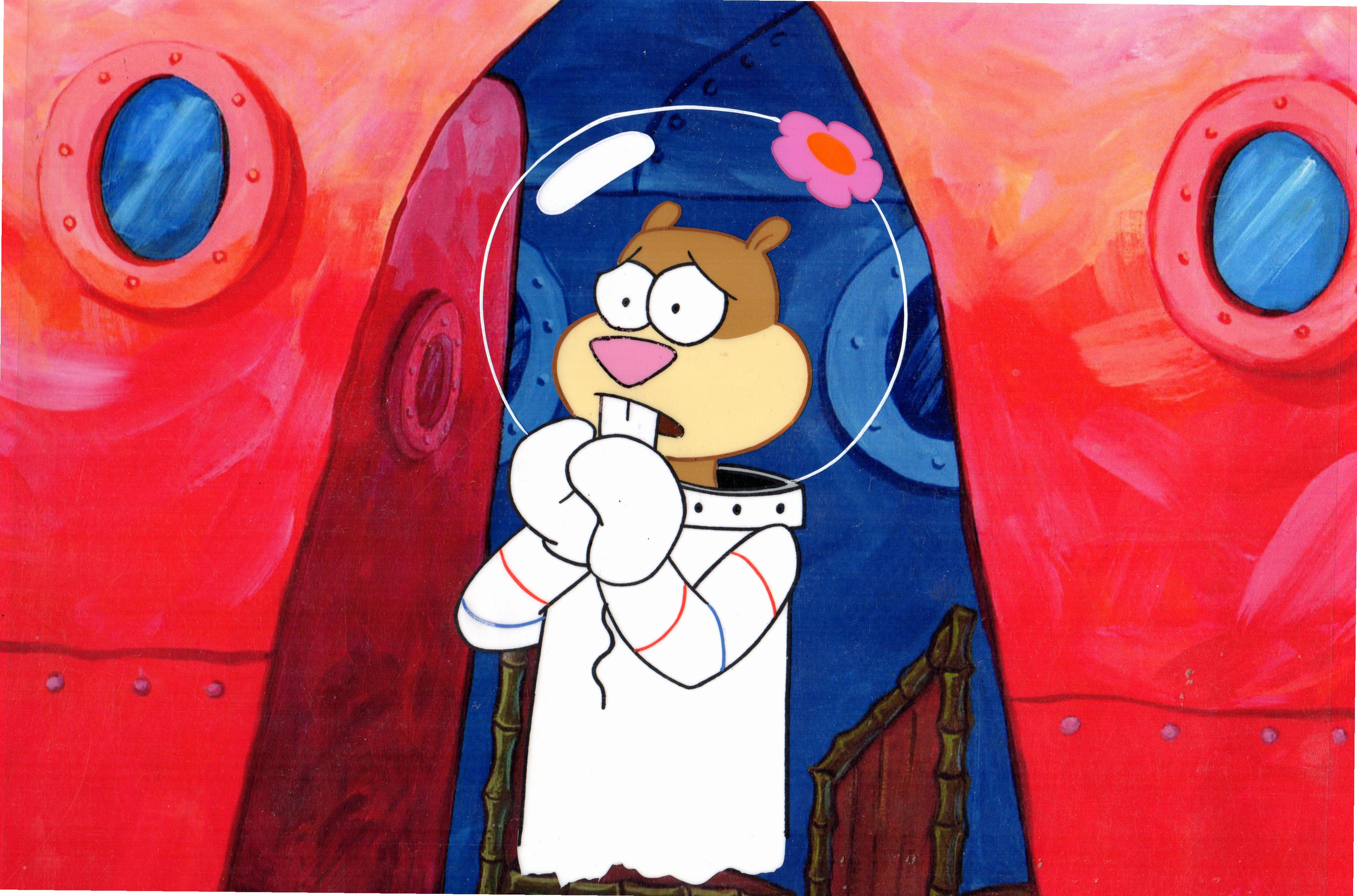 Sandy Production cel from Texas on a print background