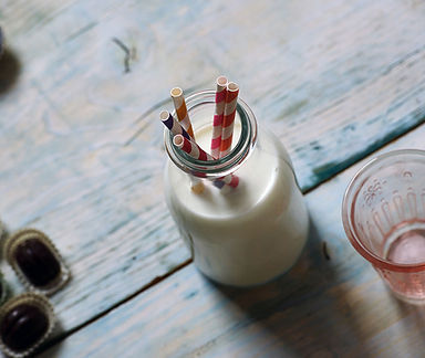 Jar of Milk with Straws