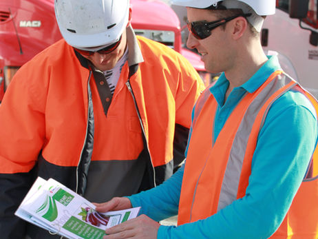 health coach showing an industrial employee health information