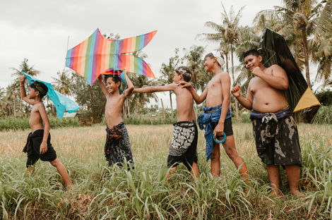 Balinese boys flying their kites