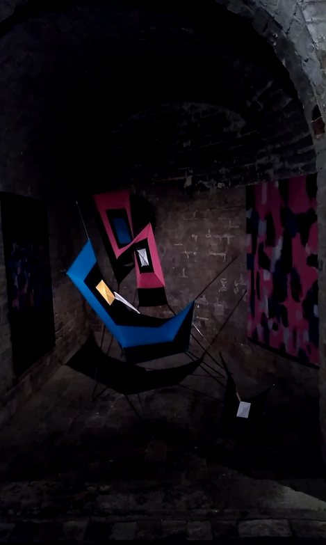 Tension blue and yellow abstract sculpture inspired by migration journeys – Threads of Resurrection by Ecuadorian artist