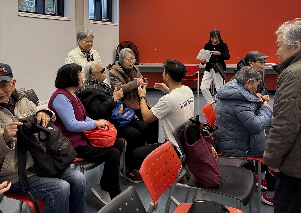WOXY nurse engages with seniors during the fall prevention session at Toronto Public Library’s Agincourt Branch, discussing test results and offering personalized guidance in a friendly, interactive setting.