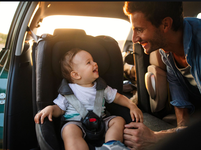 Family using rented baby equipment in Vietnam with private driver and car seat for toddler