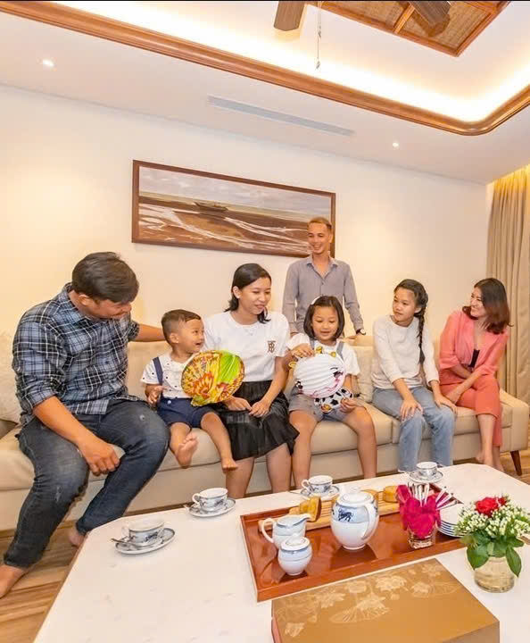 Happy family enjoying Vietnam holiday with baby feeling safe and protected