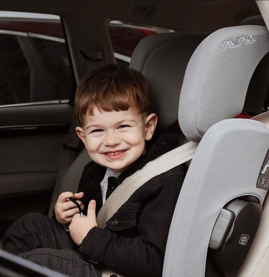 International family using a rented child car seat in Vietnam for safe travel