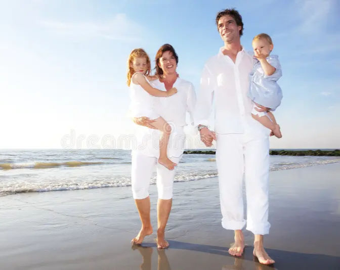 Family relaxing on Phu Quoc beach with baby during Vietnam holiday