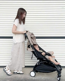 Stokke YOYO3 compact stroller folded for taxi travel between Da Nang and Hoi An