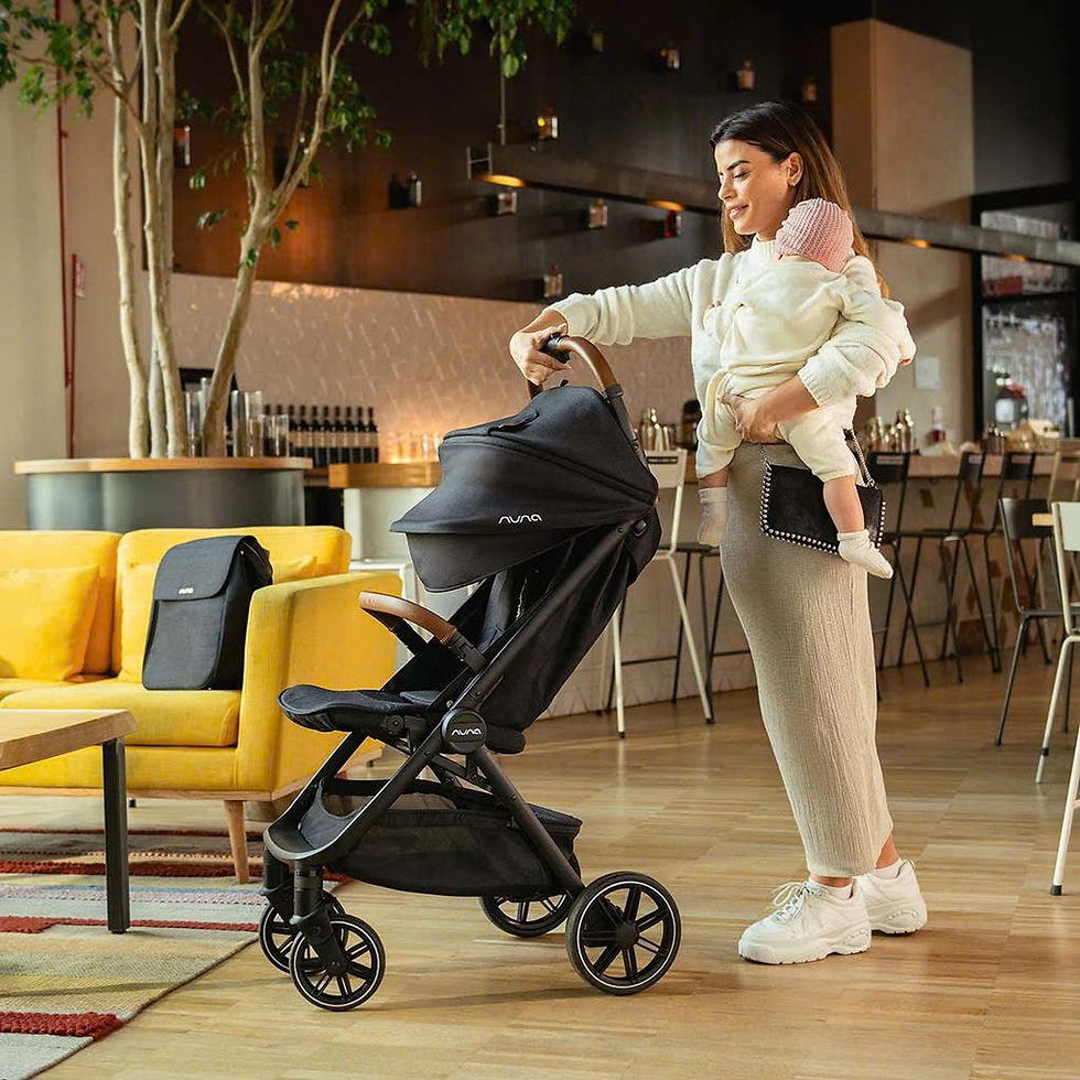 Family traveling through Vietnam airport with stroller and car seat showing baby equipment needed for multi city trips