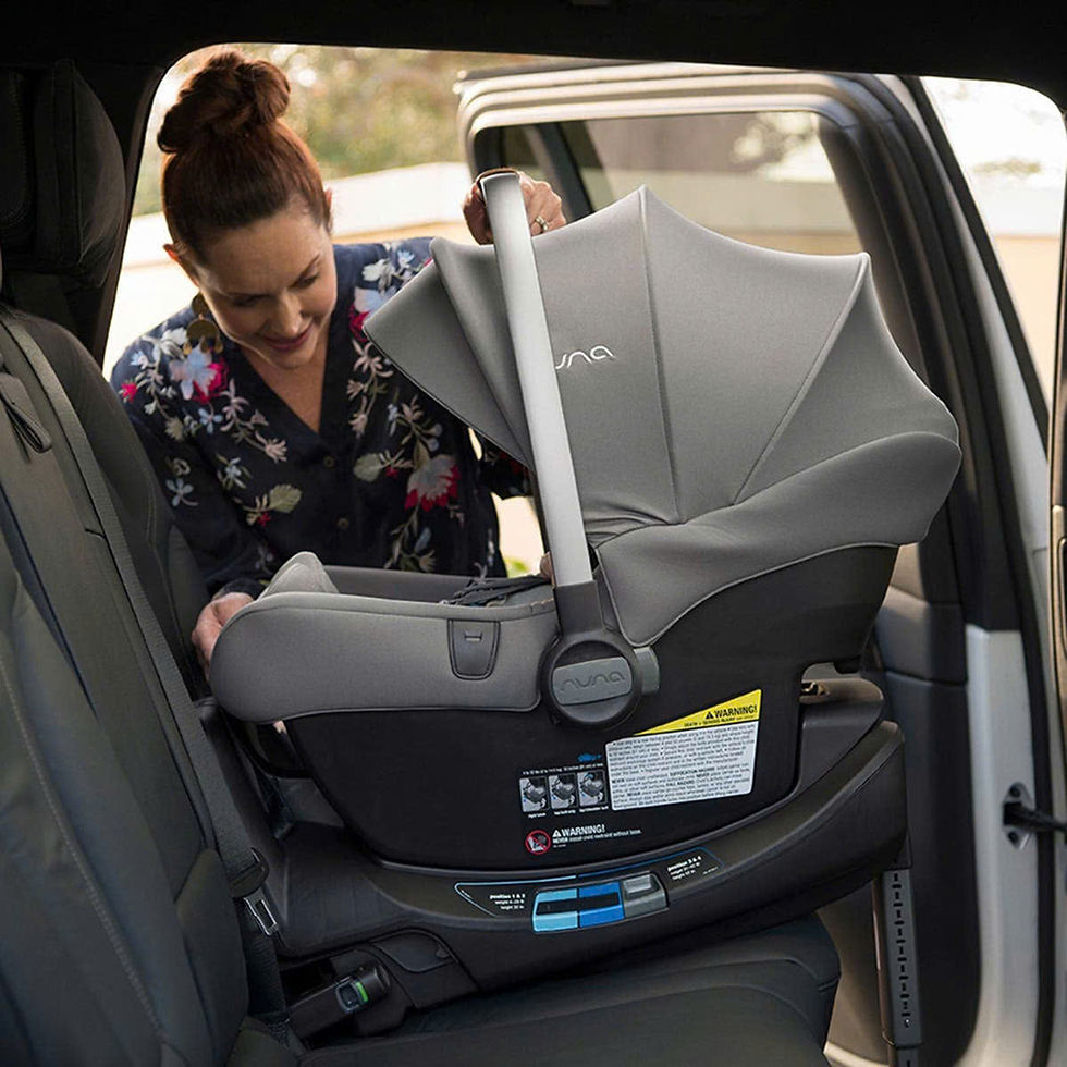 Baby travelling safely in a child car seat during an airport transfer in Vietnam
