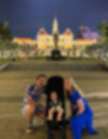 Family sightseeing in Ho Chi Minh City using a stroller
