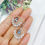 Thumbnail: Lustre Arc — Aquamarine & Diamond Halo Baby Akoya Pearl Earrings