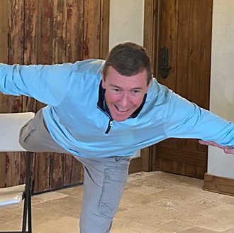 A financial executive taking a risk while being supported by his team.