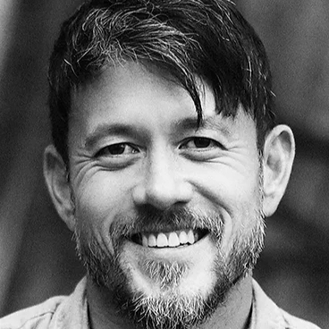 Founder Micah Voraritskul in black and white