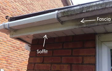 Close-up view of a building's fascia and soffit with labels in English. JustBinCleaned