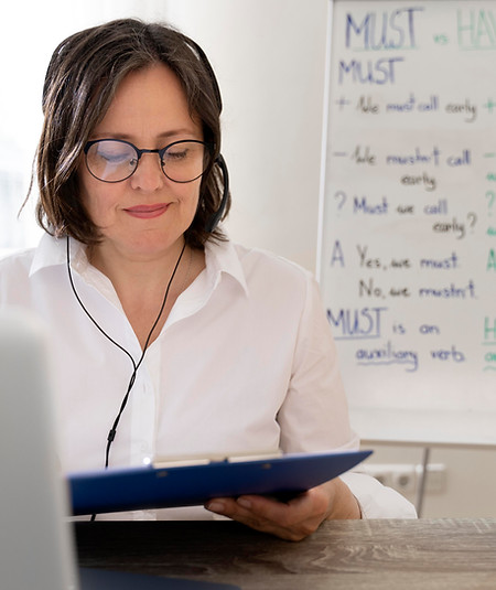 english-teacher-doing-her-lessons-online.jpg