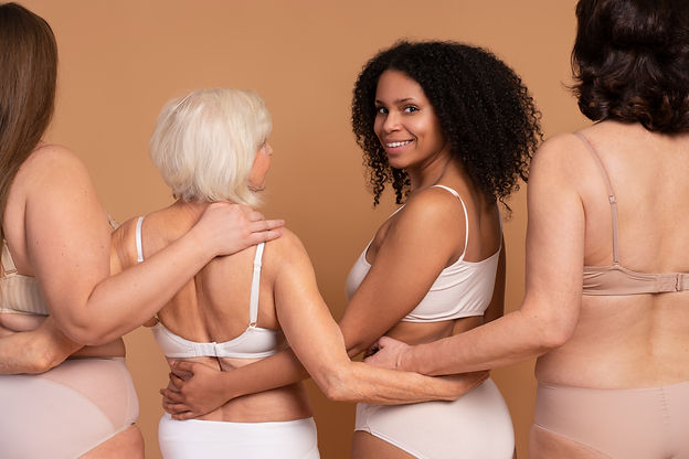close-up-smiley-women-holding-each-other.jpg