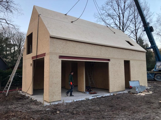 Eigentijdse eengezinswoning in Schilde, gebouwd door Wood & Build in houtmassiefbouw MAGNUMBOARD