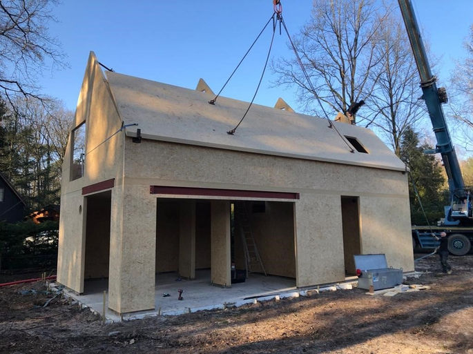 Eigentijdse eengezinswoning in Schilde, gebouwd door Wood & Build in houtmassiefbouw MAGNUMBOARD