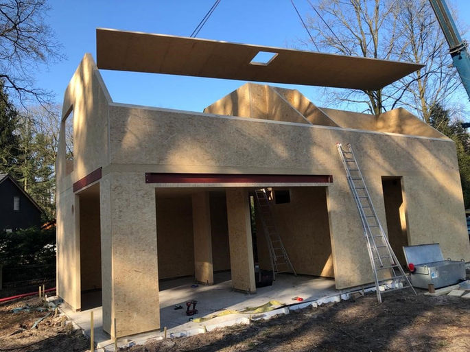 Eigentijdse eengezinswoning in Schilde, gebouwd door Wood & Build in houtmassiefbouw MAGNUMBOARD
