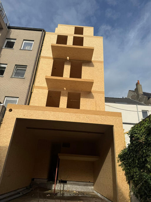 Appartement houtmassiefbouw MAGNUMBOARD door Wood & Build in Oostende