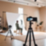 _A modern content creator filming a product with a professional camera on tripod in a well