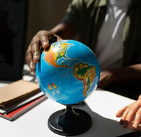 front-view-man-holding-world-globe.jpg