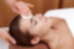 woman getting an anti-aging facial treatment