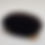 Thumbnail: A black natural boar bristle brush lying on its side, with the bristles facing the camera