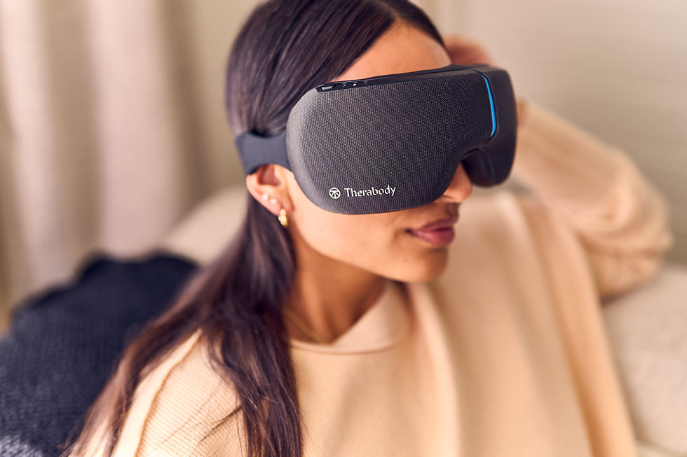 Thumbnail: Woman wearing Therabody eye mask with logo, promoting relaxation and comfort