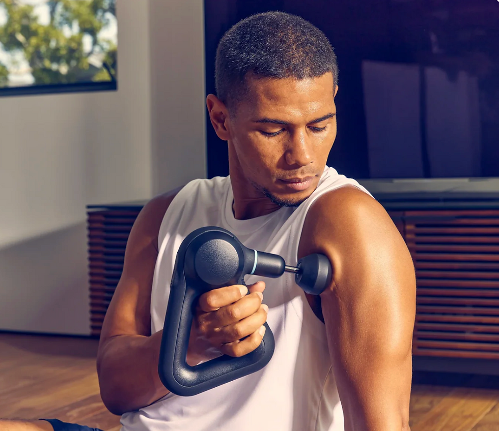 Thumbnail: Man using Theragun Prime on his arm, elevating therapy at home. 