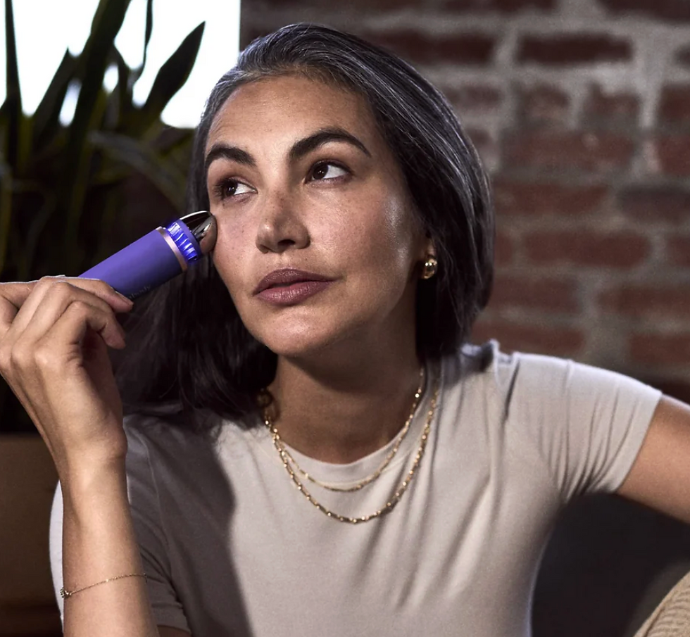 Thumbnail: Woman using device on face, indoors
